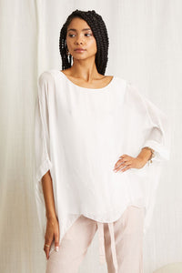 Flowy silky top for summer. Color white